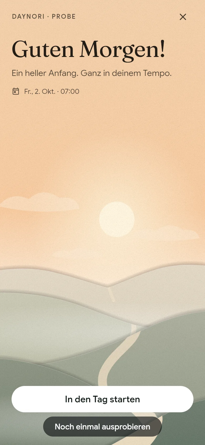 Die Begrüßung „Guten Morgen!“ über der Morgenlandschaft.