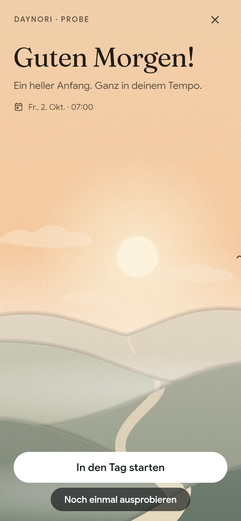 Die Begrüßung „Guten Morgen!“ über der Morgenlandschaft.