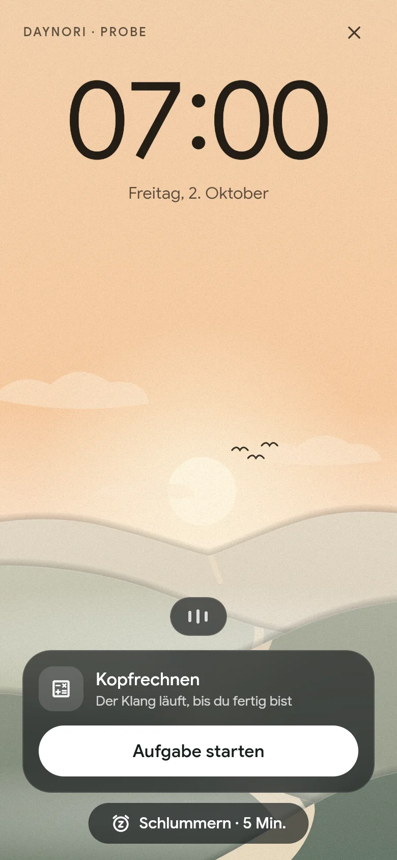 Der Wecker klingelt um 07:00 über der Morgenlandschaft.