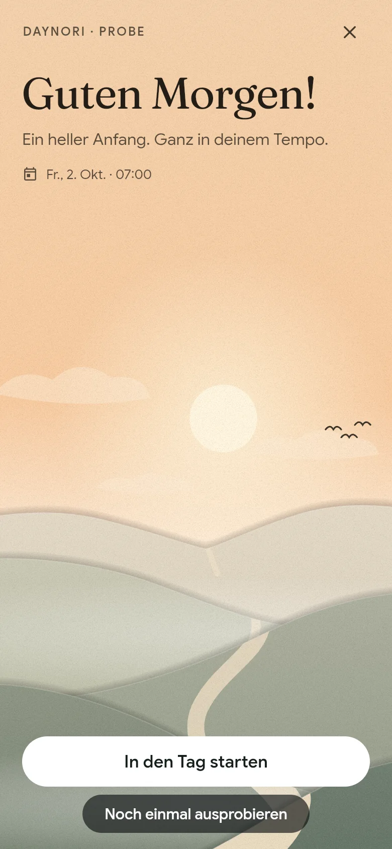 Die Begrüßung „Guten Morgen!“ über der Morgenlandschaft.