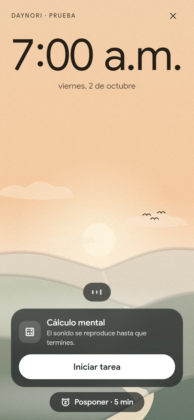 La alarma suena a las 07:00 sobre el paisaje de la mañana.