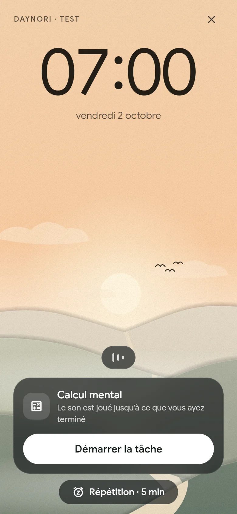L’alarme sonne à 07:00 au-dessus du paysage matinal.