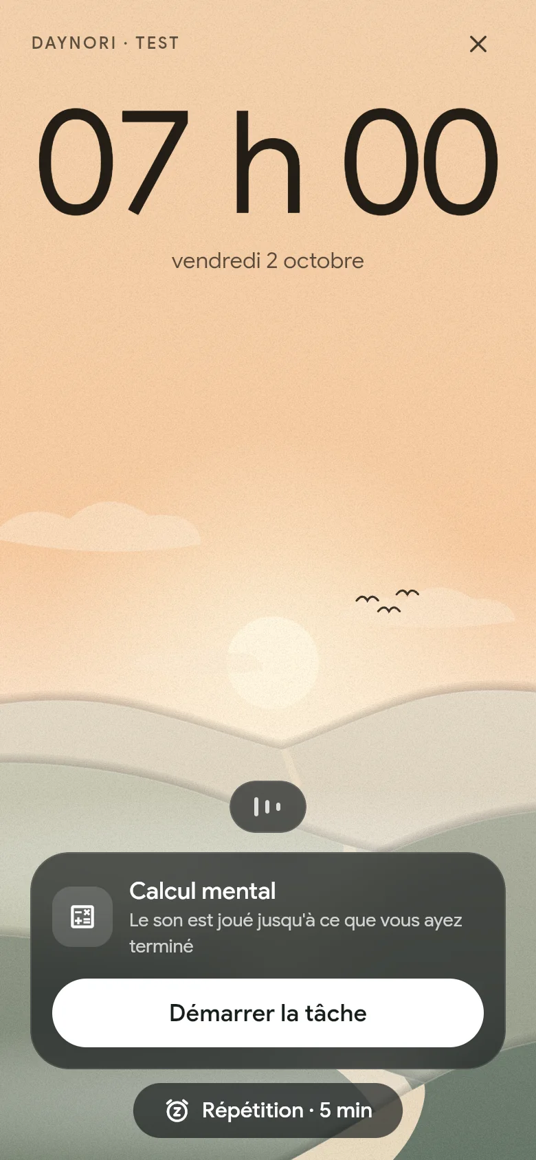 L’alarme sonne à 07:00 au-dessus du paysage matinal.
