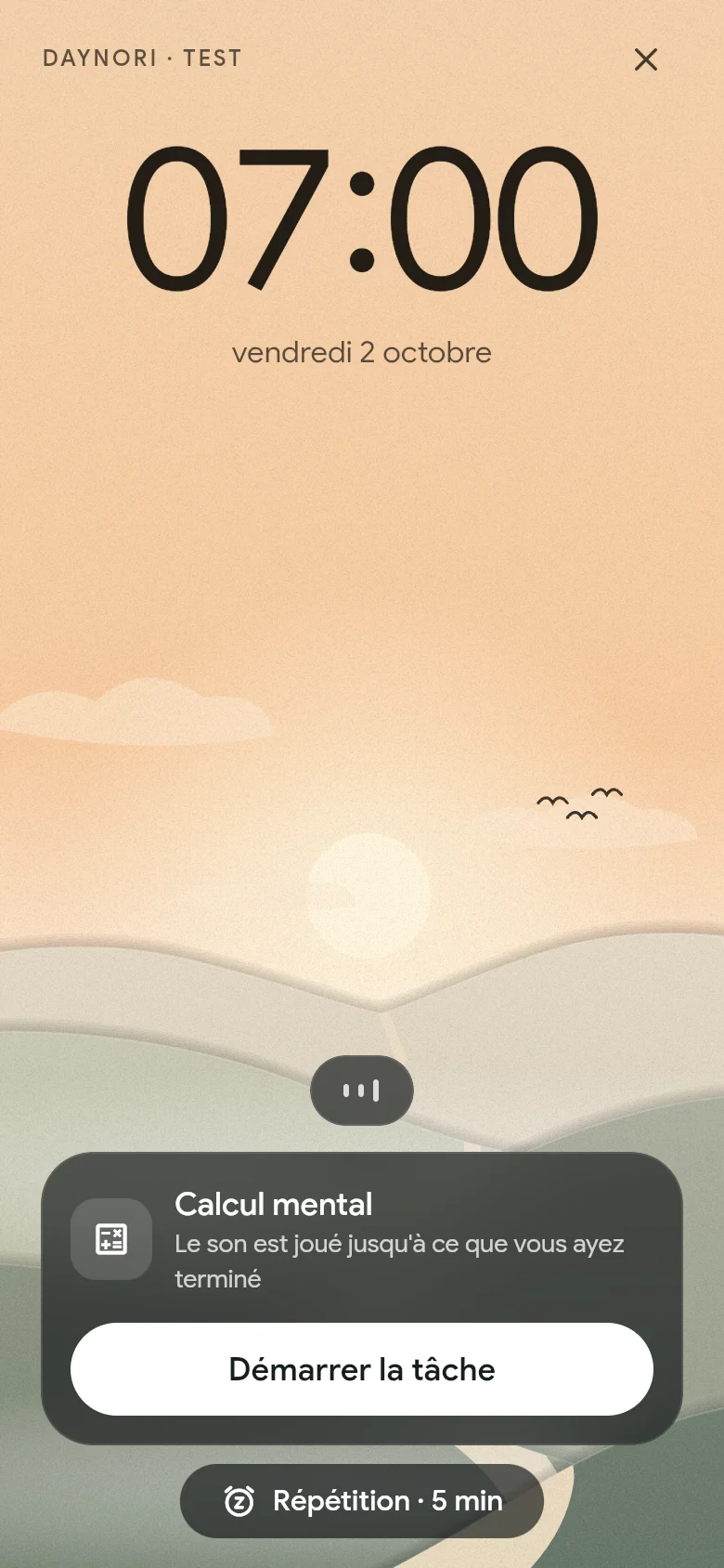 L’alarme sonne à 07:00 au-dessus du paysage matinal.