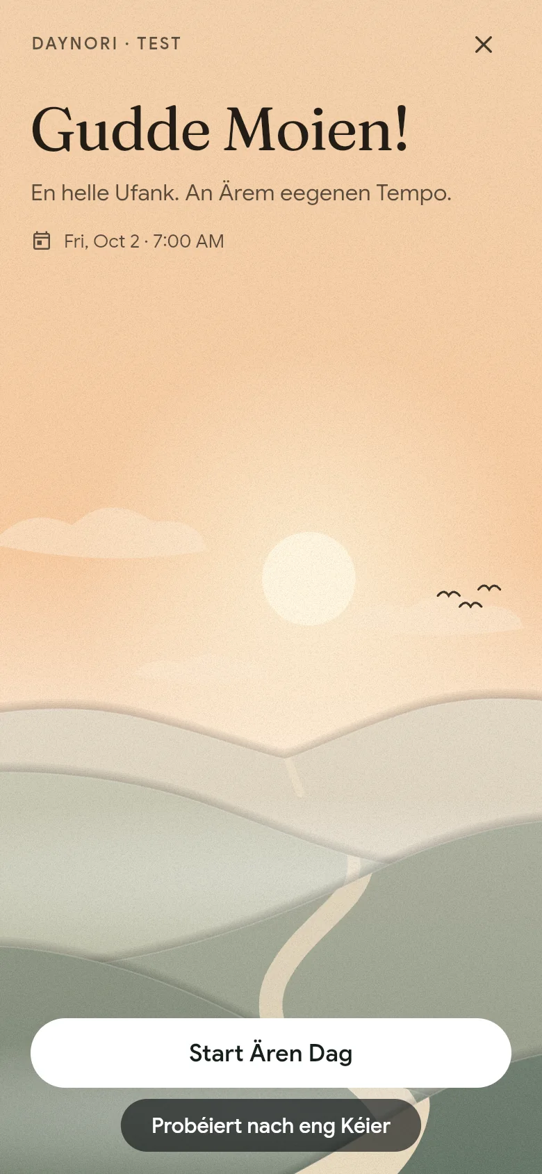 D’Begréissung „Gudde Moien!“ iwwer der Moieslandschaft.